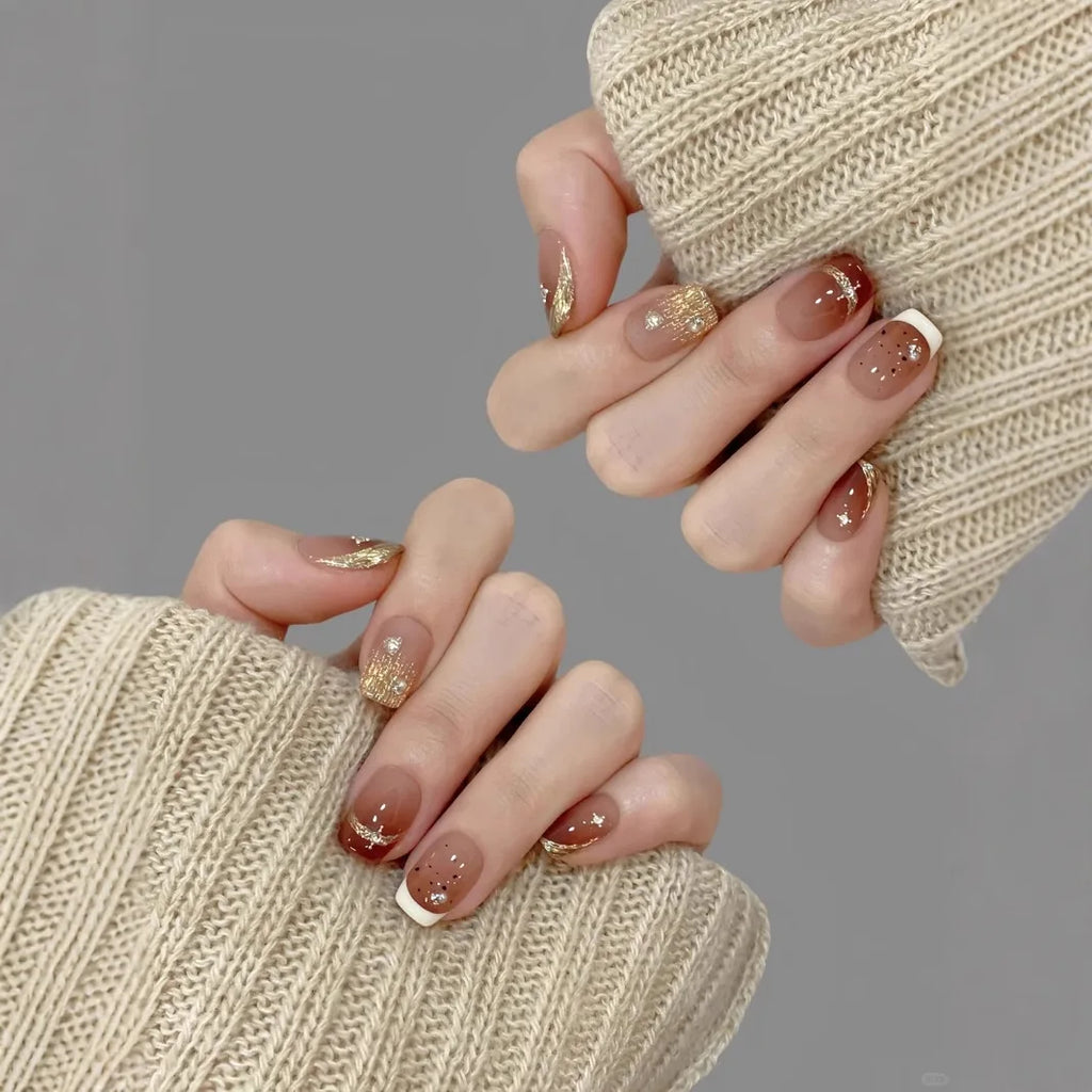 Golden Amber Cat-Eye Press-On Nails on hand